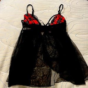 Size xsmall red plaid and black slip. From Victoria secret. Like new!